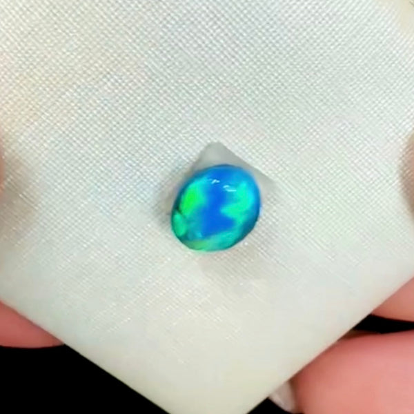 0.85ct black opal 6.4x 5.5x3.8MM