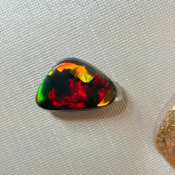 0.77ct black opal 9.6x 6.4x2MM